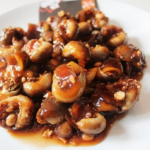 Ốc mỡ xào me