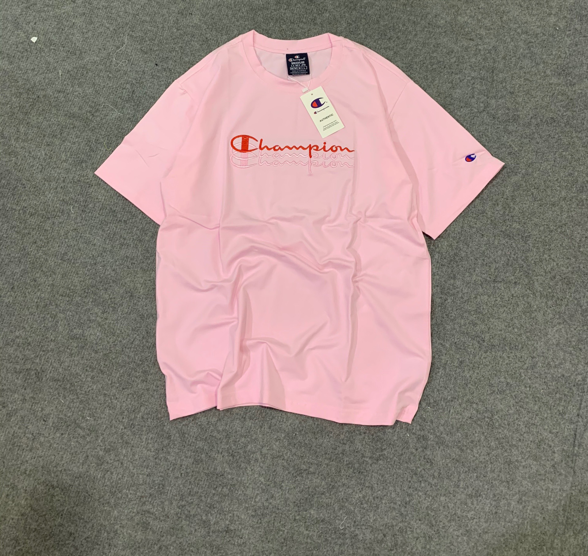 TEE CHAMPION